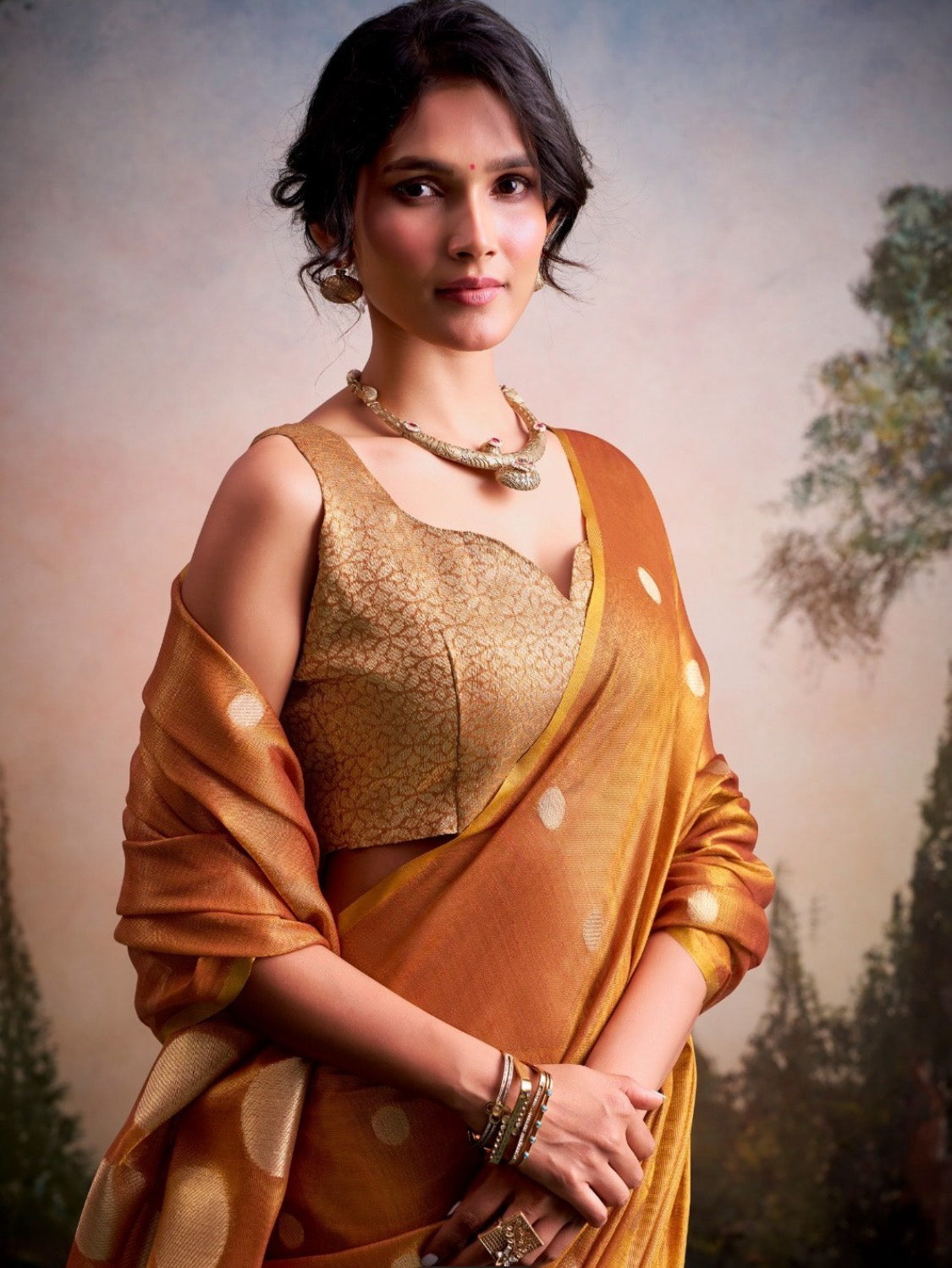 Anvika Orange Tissue Silk Saree